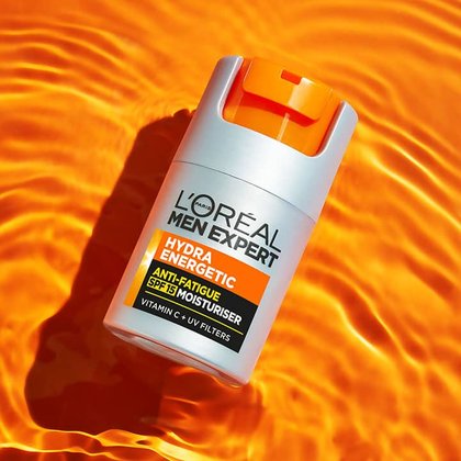 תמונת מוצר קרם לחות SPF15 על רקע כתום